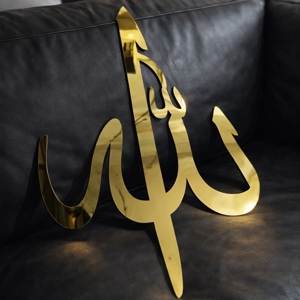 Gold decorative item on a black leather couch