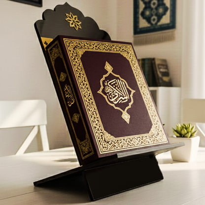 Decorative Quran stand with a Quran on a table in a home setting