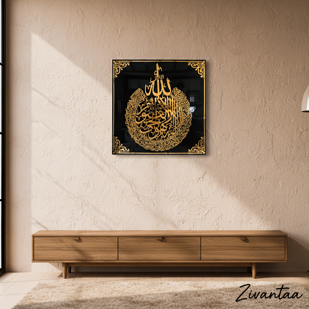 Decorative wall art with gold calligraphy on a black background in a modern living room.