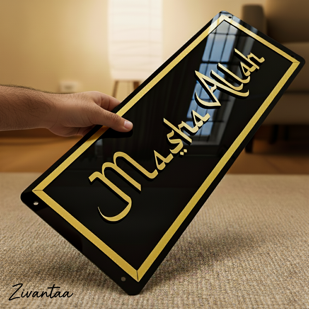 Person holding a black sign with 'Masha'Alah' in gold, blurred background