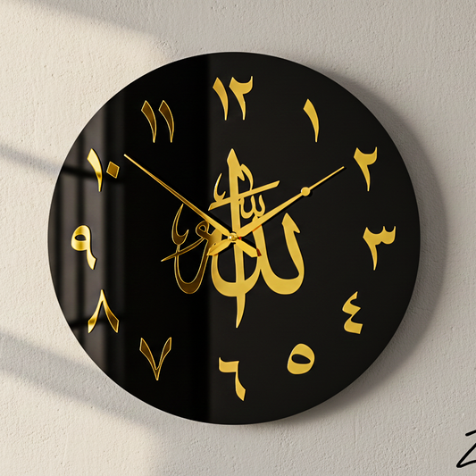 Wall clock with gold Arabic calligraphy on a black background