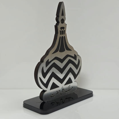 Decorative object with black and gray design on a white background