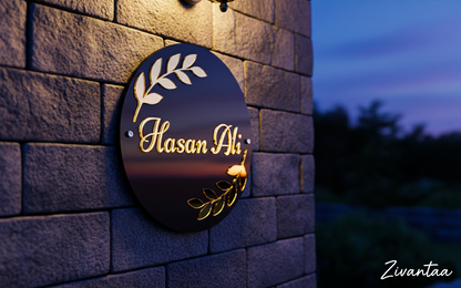 Decorative sign with 'Hasan Ali' on a stone wall at dusk