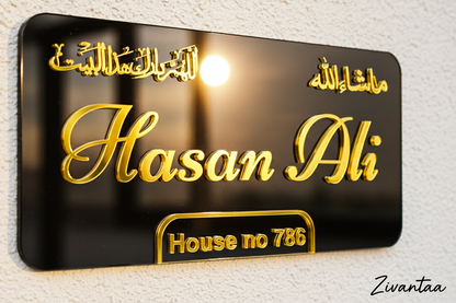 Black plaque with gold text displaying 'Hasan Ali' and 'House no 786' on a textured background