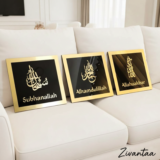 Three framed Islamic calligraphy pieces on a white couch with 'Zivantaa' branding.
