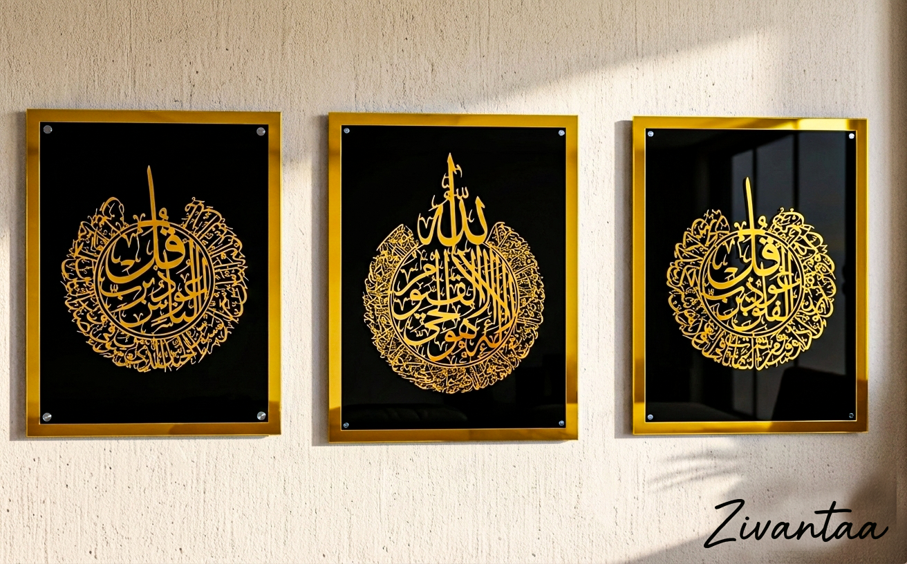 Three framed pieces of art with gold calligraphy on a black background, displayed on a wall.