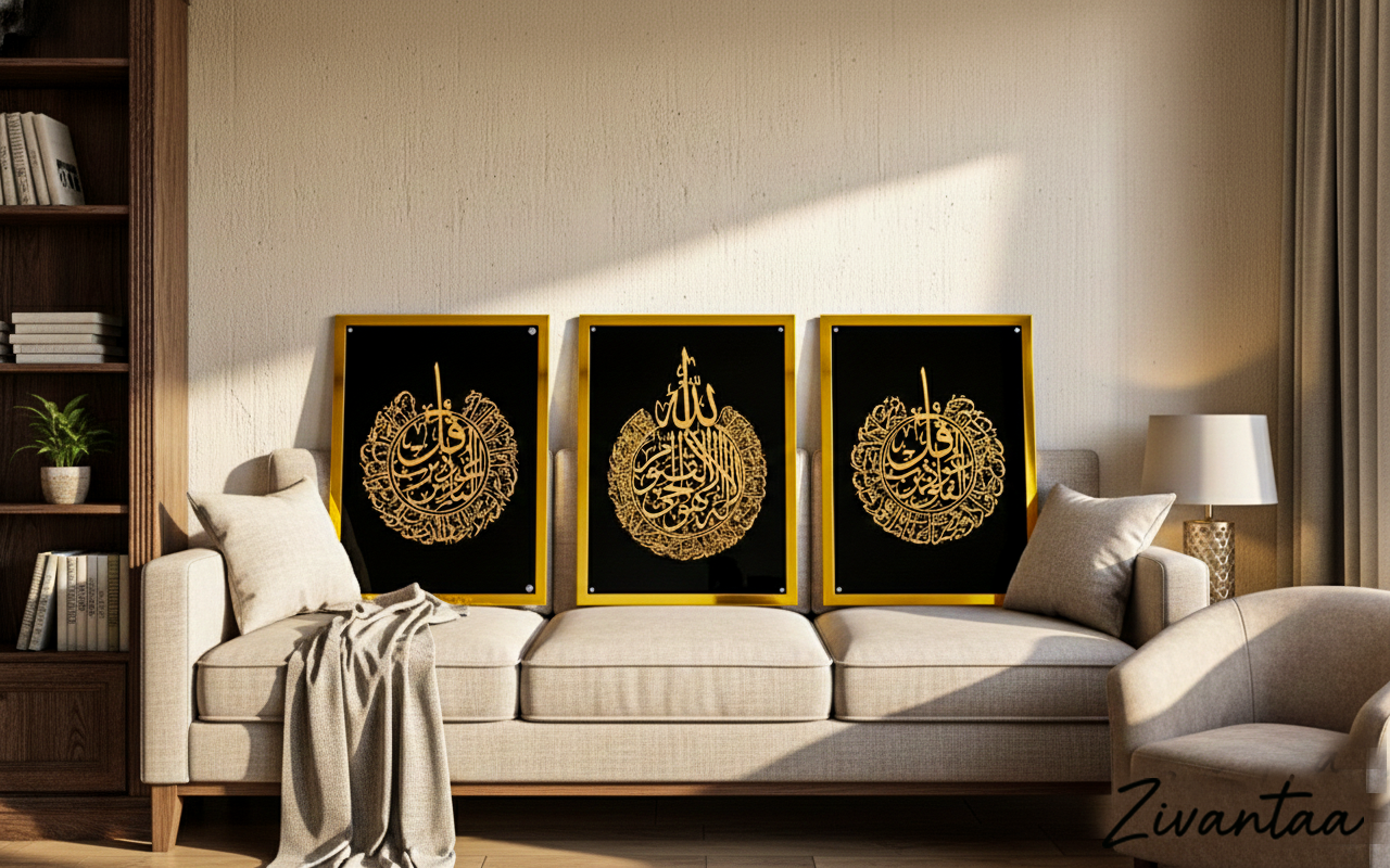Three framed decorative pieces with gold calligraphy on a wall above a sofa.